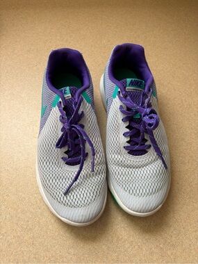 Nike Women's Lavender Running Shoes with Purple and Teal Accents
